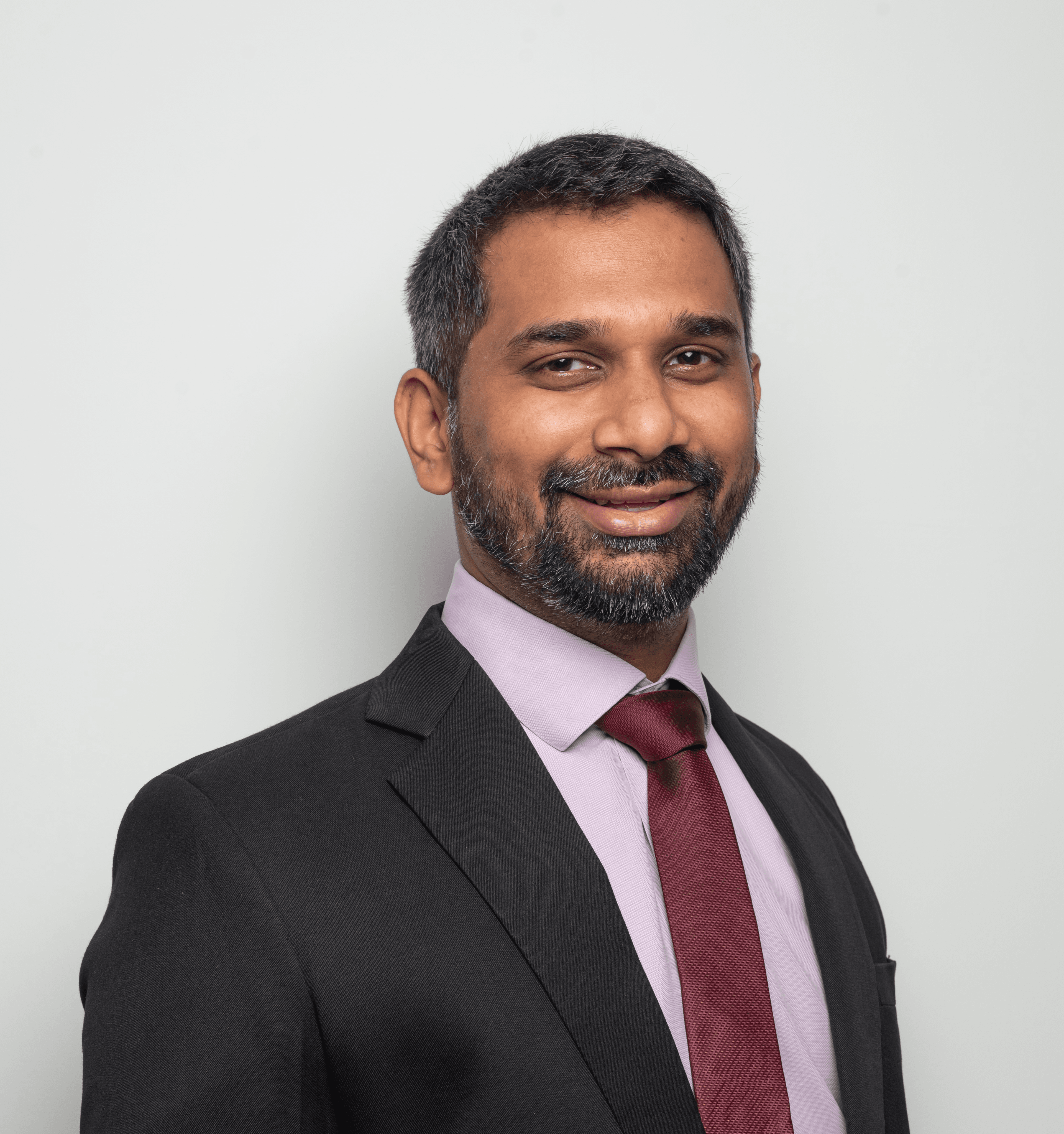 A professional headshot of Vinay Sekar, Chief Executive Officer at Cube Highways InvIT